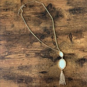 White and gold long necklace with tassel